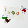 Needlepoint Kit project with sports-themed designs and color swatches on a white background