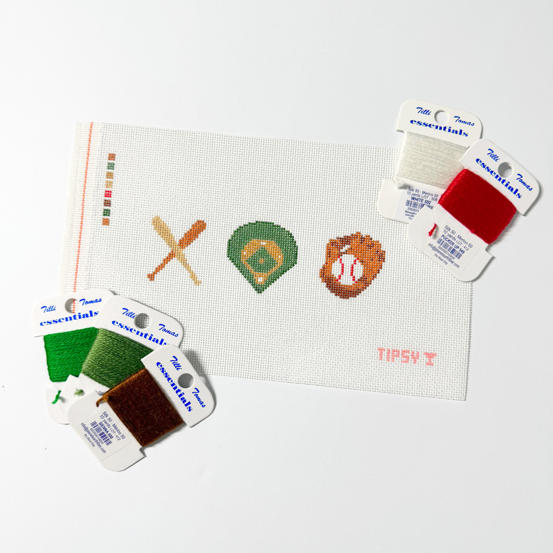 Needlepoint Kit project with sports-themed designs and color swatches on a white background
