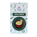 Queso Needle Minder
