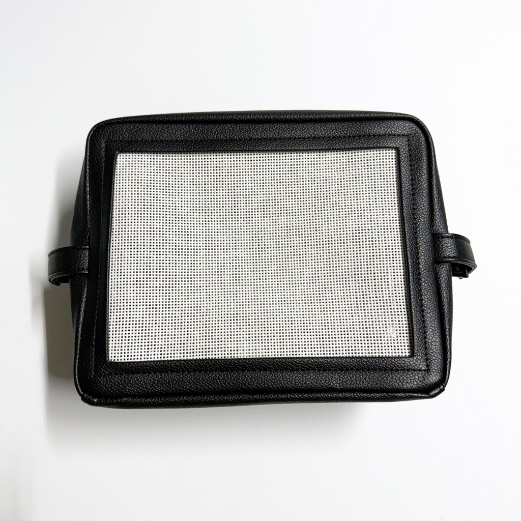 black stitchable needlepoint kit and pouch from Threaded & Tipsy
