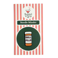 needle minder with 'Chill Pills' design on a striped background, branded as 'Threaded & Tipsy'.