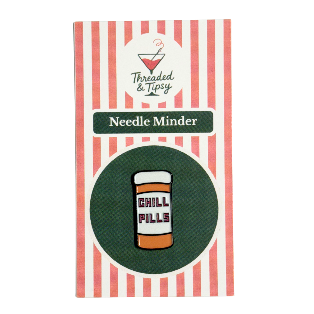needle minder with 'Chill Pills' design on a striped background, branded as 'Threaded & Tipsy'.
